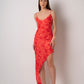 Red muslin dress with a V-neckline and slim strap shoulders
