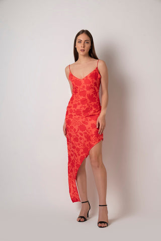 Red muslin dress with a V-neckline and slim strap shoulders