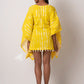 Back view of yellow tie-dye kimono dress showcasing relaxed fit and straight kaftan sleeves.
